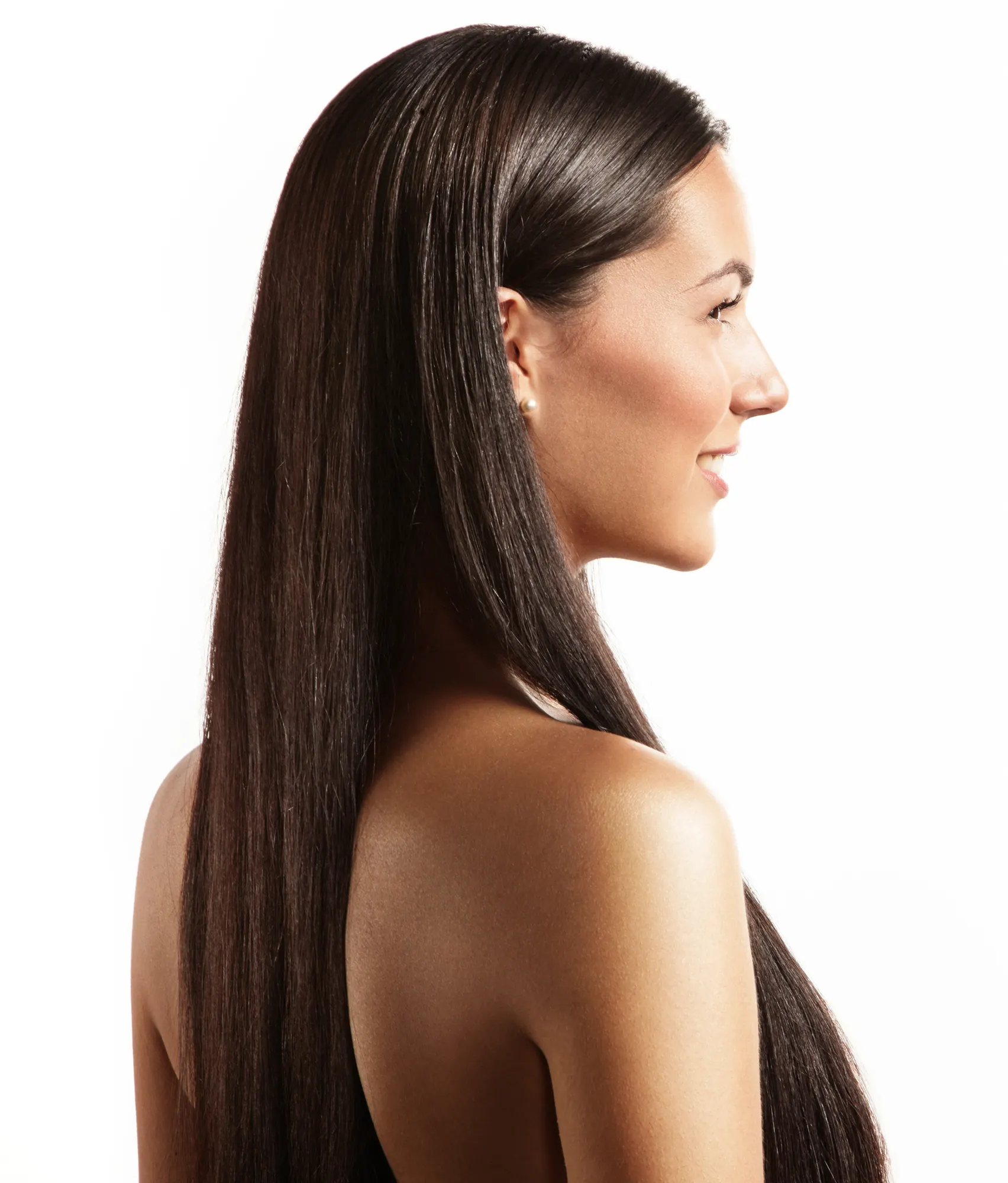 Mulher de perfil com cabelo longo, liso e brilhante